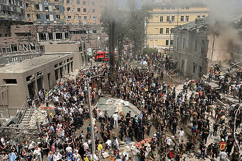 Rescue teams search rubble after russian attack kills dozens in Kyiv
